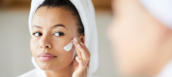 Benefits of Adaptogens In-Article Image 03 woman putting cream on her face