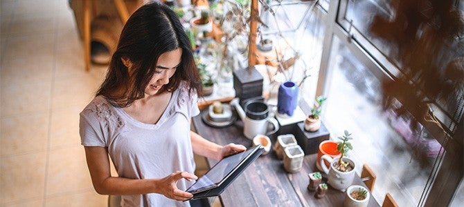 Gig Economy-03 girl looking at a tablet